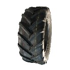 Tyre 26x12.00-12 DURO HF-255 – angled view showing black rubber with yellow branding and 4PR construction.