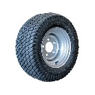 Roue complète BKT 23x10.50-12 – jante en acier gris et pneu noir avec motif de bande de roulement visible.