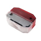 Vista dall'alto – lente Aspöck Flexpoint luce d'ingombro rosso/bianco con superficie rigata e due fori di montaggio.