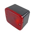 Aspöck Fogpoint rear fog light – front view showing red lens cover and two mounting holes.