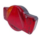 Humbaur multifunctioneel licht links – met rode driehoekige reflector en oranje zijlicht, voor diverse lichtfuncties.