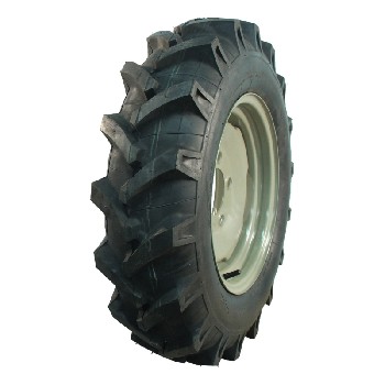 Tractor tire – angled view showcasing deep tread pattern and black color with KINGS TIRE V-8509 branding.