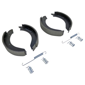 Brake shoes – top view showing curved black and gray metallic backing with spring fasteners.