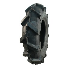 Sidevisning af KINGS TIRE dæk 13x5.00-6 V-8803 – sort med mønster til traktorer og maskiner.