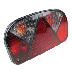 Luminaire Aspöck Multipoint II – feu arrière gauche avec lentilles triangulaires rouges et sections claires.
