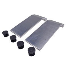 Replacement bracket – top view showing two silver ramp supports and four black rubber plugs on a plain white background