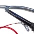 Hand brake lever for Al-ko overrun hitches – silver and black with a gas spring and red cable, detailed view.