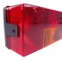 Hella vier-kamer lamp 9385 – links zonder KZL – met rode en oranje lenzen en reflecterend oppervlak.