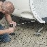 Prolunga adattatore 440 mm – 19 mm per martinetto caravan in grigio e bianco, vista frontale su sfondo di cemento.