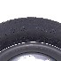 Detaljvy av däck 135/80 R13 – svart med grå fälg 4J x 13 och 4 hål, tillverkat av Linglong.